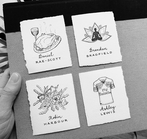 A set of handmade name cards with unique illustrations