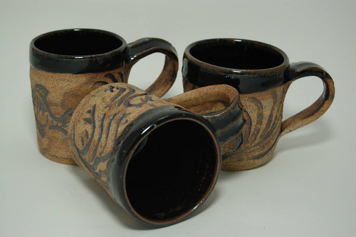 Return to: Gallery Hand Carved Mugs by Jack Caselles