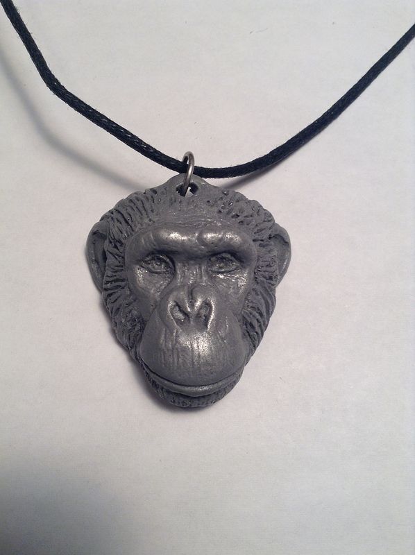 Loulis chimpanzee pendant light cold cast pewter Loulis chimpanzee pendant light cold cast pewter by Jason Shanaman