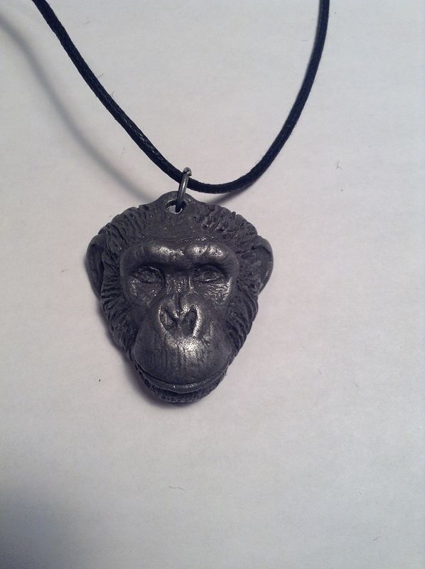 Loulis chimpanzee pendant dark cold cast pewter Loulis chimpanzee pendant dark cold cast pewter by Jason Shanaman