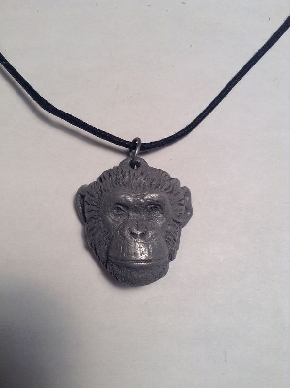 Topo chimpanzee pendant chimps inc. light cold cast pewter Topo chimpanzee pendant chimps inc. light cold cast pewter by Jason Shanaman