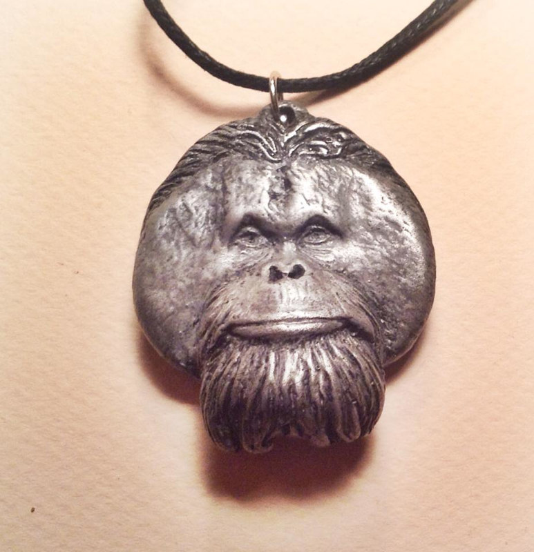 Pongo orangutan pendant cold cast pewter Pongo orangutan pendant cold cast pewter by Jason Shanaman