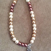 brown and white pearls with owl charm //images.artistrunwebsite.com/gallery/img_1898071464740980_large.jpg?1477018793