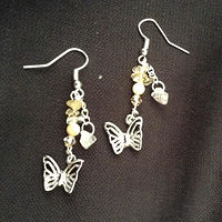 Butterfly earring with citrine stones //images.artistrunwebsite.com/gallery/img_1898861464814992_large.jpg?1477018792