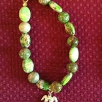 Green jasper bracelet with 14k gold plated turtle charm //images.artistrunwebsite.com/gallery/img_2234821487637704_large.jpg?1487637977