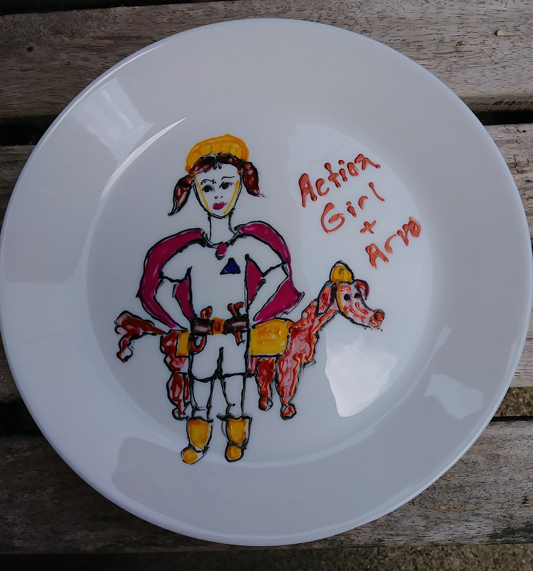 Action Girl and her dog Arvo plate Action Girl and her dog Arvo plate by Michelle Marcotte