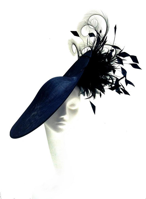 A handmade hat with black feathers