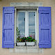 Window with Purple Shutters by Kathleen Gross
