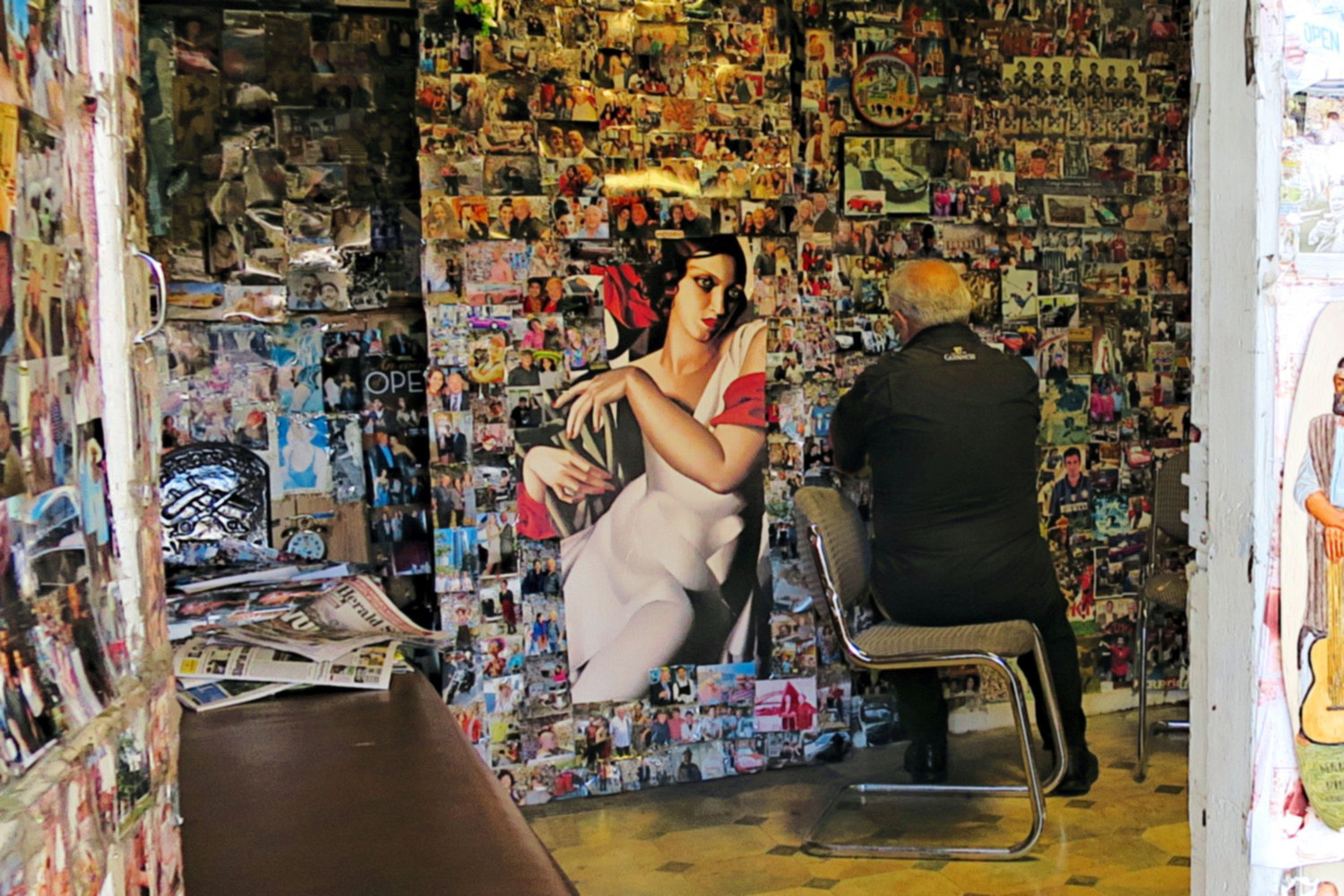 Brunswick Barber Vittorio Garfi Working on His Collage by Marc Brisson