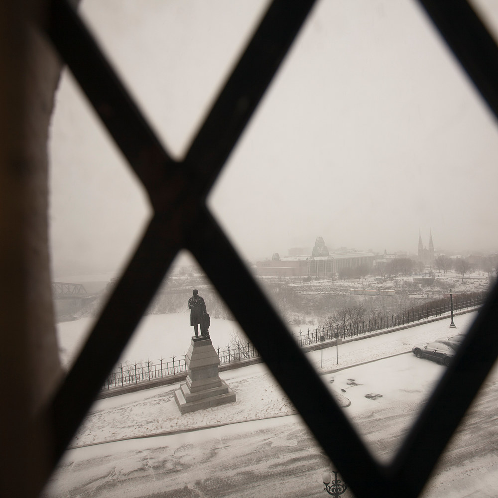 View of the statue of Sir George-Étienne Cartier with the National Gallery of Canada and Notre-Dame Cathedral in the background by Mike Steinhauer