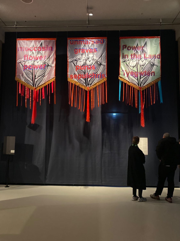 Tania Willard, ‘Groundtruthing’ (2022) vinyl banner, satin ribbon, hair